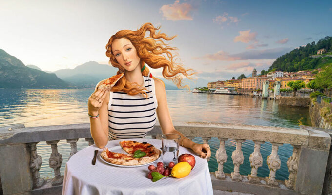 Botticelli's Venus shown eating pizza at Lake Como, as part of the 'Open to Meraviglia', controversial Italian tourism campaign.