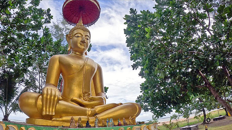 Golden seated Buddha at Ban Nam Khem Tsunami Memorial Park in Khao Lak, Thailand; photo by Ivan Kralj.