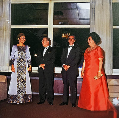 Yugoslav president Josip Broz Tito (second from the left) with his wife Jovanka (in red dress) standing besides the Iranian Shah Reza Pahlavi and his wife Farah Diba, hosted at Hotel Jama in Postojna, Slovenia, in 1973; archive photo from the hotel's lobby.