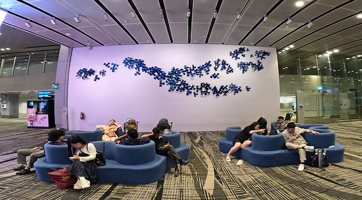 "Birds in Flight", stainless steel sculpture of Arctic terns, installed on the wall of Terminal 3 at Singapore Changi Airport; photo by Ivan Kralj.