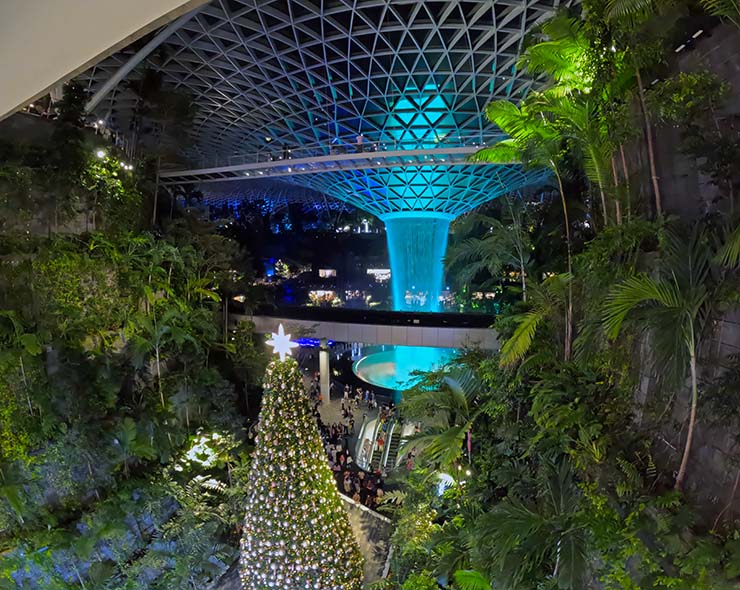 Night lights at Jewel Changi Airport, with the Rain Vortex and Shiseido Forest Valley, and a Christmas tree on New Year's Eve; photo by Ivan Kralj.