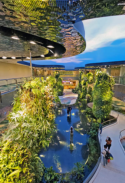 Dreamscape, a digital-sky above the towers of 20,000 plants and glass-covered fish ponds, an attraction merging nature with technology at Singapore Changi Airport; photo by Ivan Kralj.