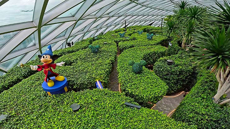 Mickey Mouse (Disney Cruise Line partnership) on the top of the Hedge Haze in the Canopy Park at Jewel Changi Airport in Singapore; photo by Ivan Kralj.