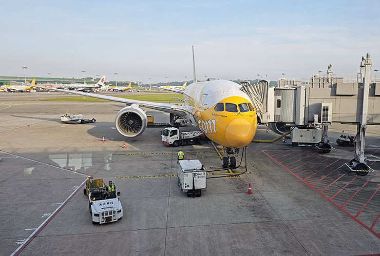 Scoot plane docked at Singapore Changi Airport, ready to depart; photo by Ivan Kralj.